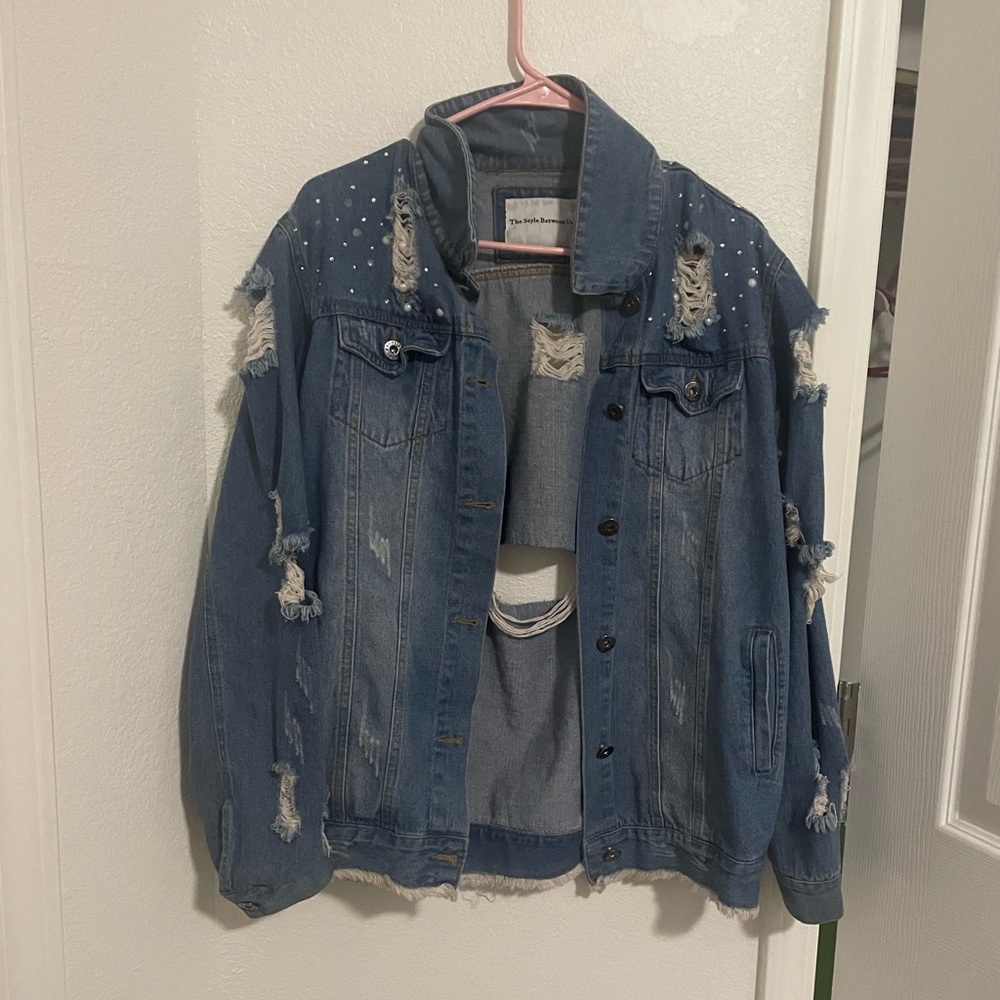 Distressed jean jacket